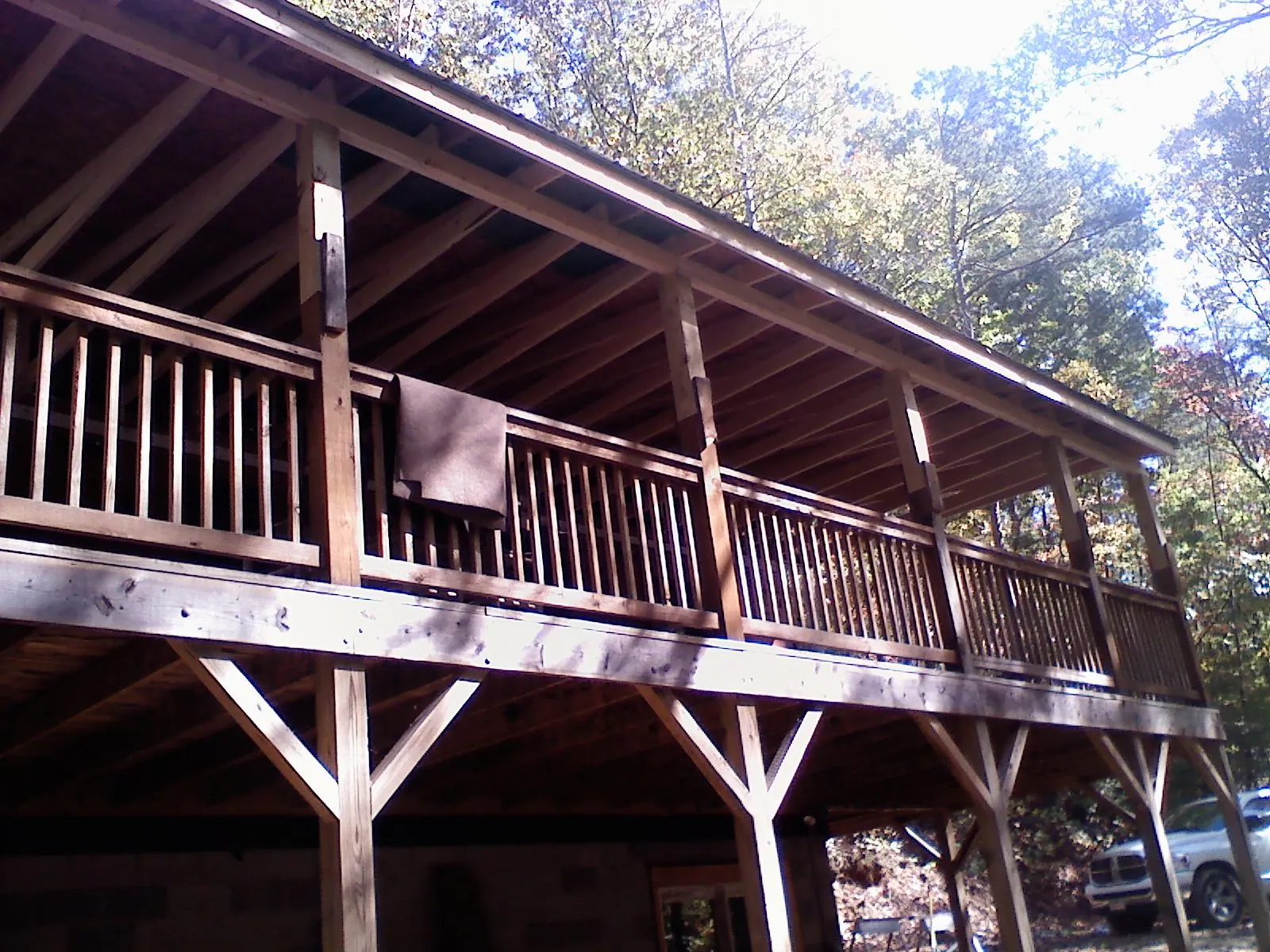 Timber framing under a new elevated porch and deck — Roof Leak Repair in Diggs by Roofing Brothers